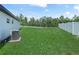A spacious backyard with grass at 41 Orchid Ct, Kissimmee, FL 34759