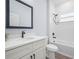 Bathroom featuring modern vanity, bath and shower, and modern fixtures at 41 Orchid Ct, Kissimmee, FL 34759