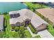 Aerial view of home featuring attached garage and screened-in lanai at 4244 Windchime Ln, Lakeland, FL 33811