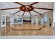 Large clubhouse recreation area with polished floors and architectural ceiling details at 4244 Windchime Ln, Lakeland, FL 33811