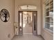 Welcoming entryway with screened lanai view at 4244 Windchime Ln, Lakeland, FL 33811