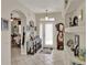 Charming foyer with tile flooring and arched doorways at 4244 Windchime Ln, Lakeland, FL 33811