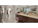 Kitchen showing granite counters and open floor plan at 4244 Windchime Ln, Lakeland, FL 33811