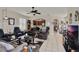 Spacious living area with open layout and tile flooring at 4244 Windchime Ln, Lakeland, FL 33811