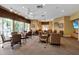 Lounge area with ample seating and natural light at 4244 Windchime Ln, Lakeland, FL 33811