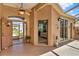 Covered patio entrance with an open door to the main house and a bedroom at 4244 Windchime Ln, Lakeland, FL 33811