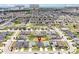 Aerial view of the residential community with nearby shopping, pool, and amenities at 4505 Hummingbird Ln, Haines City, FL 33844