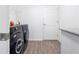Convenient laundry room equipped with modern washer and dryer at 4505 Hummingbird Ln, Haines City, FL 33844