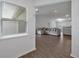 Bright living room with hard wood floors, an open floorplan, and lots of natural light at 4505 Hummingbird Ln, Haines City, FL 33844