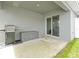 Covered patio space perfect for outdoor dining with easy access to the backyard at 4505 Hummingbird Ln, Haines City, FL 33844