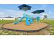 Community playground with slides and shaded areas at 4505 Hummingbird Ln, Haines City, FL 33844