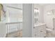 Bright bathroom with updated vanity, sink, and toilet, plus decorative wall art at 4570 Tower Pine Rd # Ge, Orlando, FL 32839