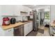 Well-equipped kitchen with stainless steel appliances, light countertops, and modern fixtures, ideal for cooking and meal prep at 4570 Tower Pine Rd # Ge, Orlando, FL 32839