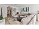 Comfortable living room with a large sectional sofa, stylish decor, and plenty of natural light at 4570 Tower Pine Rd # Ge, Orlando, FL 32839