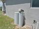 This home features a modern water softener system for enhanced water quality and appliance longevity at 546 Lorient Dr, Eagle Lake, FL 33839