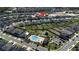 Beautiful community view with a community pool and well-manicured lawns surrounding the attractive single-Gathering homes at 568 Meadow Bend Dr, Davenport, FL 33837