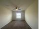 Bedroom featuring neutral walls, carpet flooring, and a ceiling fan at 568 Meadow Bend Dr, Davenport, FL 33837