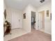 Bright entryway features neutral walls, tile flooring, and decorative touches at 568 Meadow Bend Dr, Davenport, FL 33837
