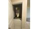A furnace sits behind a white door and is a Lennox brand at 568 Meadow Bend Dr, Davenport, FL 33837