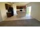 Bright kitchen featuring a center island, modern appliances, and lots of counter space at 568 Meadow Bend Dr, Davenport, FL 33837