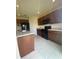 Modern kitchen with stainless steel appliances and plenty of counter space at 568 Meadow Bend Dr, Davenport, FL 33837