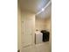 Laundry room features a washing machine, dryer, and tile flooring at 568 Meadow Bend Dr, Davenport, FL 33837