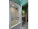 Modern bathroom featuring a sleek vanity, toilet, shower head, and a beautifully tiled shower and tub combo at 760 Bearcreek Dr, Bartow, FL 33830