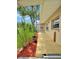 Exterior shot of the home showing a deck surrounded by plants at 760 Bearcreek Dr, Bartow, FL 33830