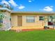 Inviting exterior featuring a wood deck that surrounds the house at 760 Bearcreek Dr, Bartow, FL 33830
