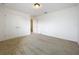 Cozy bedroom with carpet, a ceiling light, and closet doors for ample storage at 771 Cavan Dr, Apopka, FL 32703
