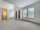 Open living room with tile foyer, and two windows at 771 Cavan Dr, Apopka, FL 32703