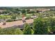 Aerial shot showcases lush landscaping, surrounding community, and prime location at 8401 Riverdale Ln # 8401, Davenport, FL 33896