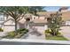 Charming townhome featuring a tile roof, two-car garage, and well-manicured landscaping at 8401 Riverdale Ln # 8401, Davenport, FL 33896