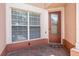 Welcoming front entrance featuring a decorative glass door and covered patio area at 8401 Riverdale Ln # 8401, Davenport, FL 33896