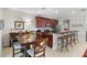 Bright kitchen with wooden table and four chairs at 8401 Riverdale Ln # 8401, Davenport, FL 33896