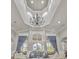 The beautiful lobby offers comfortable seating and an elegant chandelier at 8401 Riverdale Ln # 8401, Davenport, FL 33896