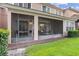 Covered patio offers a relaxing space with outdoor seating, with views into living area at 8401 Riverdale Ln # 8401, Davenport, FL 33896