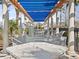 Shaded pergola near the pool with plenty of seating perfect for entertaining and relaxing at 8401 Riverdale Ln # 8401, Davenport, FL 33896