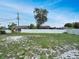 Fenced backyard offers plentiful sunshine and green lawn at 925 Roswell Ter, Deltona, FL 32738