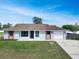 Charming single story home featuring a well-maintained lawn and attached one car garage at 925 Roswell Ter, Deltona, FL 32738