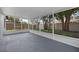 Enclosed porch featuring views of the yard at 946 Little Creek Rd, Orlando, FL 32825