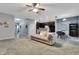 Open-concept living room showing direct access to the kitchen and dining area at 954 Revere Ave, Haines City, FL 33844