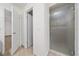 Bathroom with tiled floors and a glass-enclosed shower at 112 Rosewood Ct, Kissimmee, FL 34743