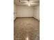 A serene room with tile flooring, ceiling fan and a neutral color palette offers style and comfort at 112 Rosewood Ct, Kissimmee, FL 34743