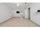 Bright bedroom featuring a ceiling fan, large window, and tile flooring at 112 Rosewood Ct, Kissimmee, FL 34743