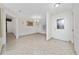 Elegant foyer with a decorative glass front door, chandelier, and tile flooring at 112 Rosewood Ct, Kissimmee, FL 34743