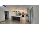 Spacious kitchen featuring a center island and stainless steel appliances at 112 Rosewood Ct, Kissimmee, FL 34743