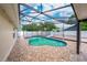 Enclosed swimming pool with a slide and a spacious patio area for outdoor enjoyment and recreation at 112 Rosewood Ct, Kissimmee, FL 34743