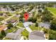 Overhead view of a single Gathering home on a large lot with a private screened-in pool and fenced backyard at 113 Candlewood Ct, Kissimmee, FL 34743