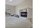 Stylish bedroom with a comfortable sofa and a unique built-in storage unit and murphy bed at 1357 Venezia Ct # 302, Davenport, FL 33896